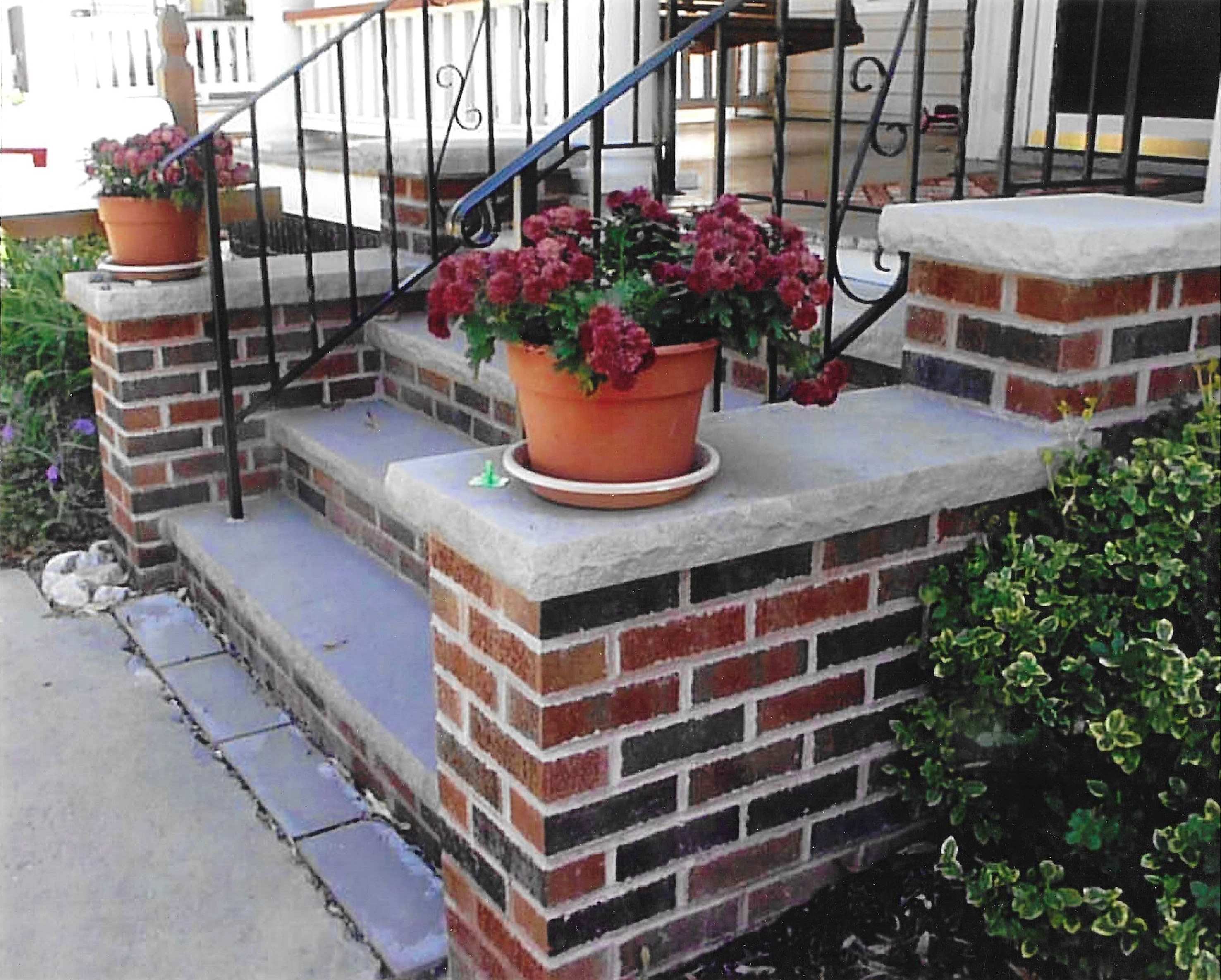brick and stone steps with railing