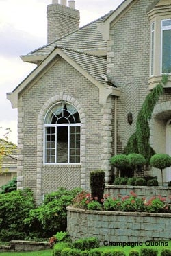 Brick Faced House with Tiered Retaining Wall