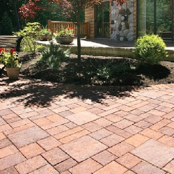 Tiered patio and steps with floral planter